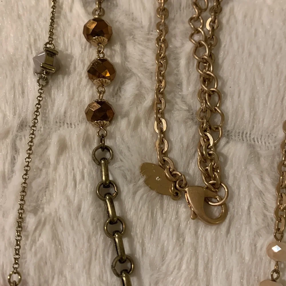 2‎ necklace’s with some beads.Gold tone and silver tone